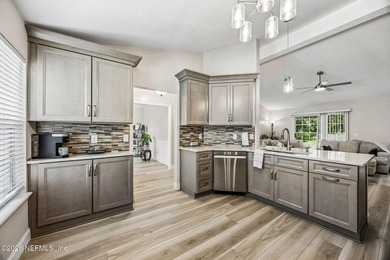 Beautifully remodeled in Hunters Green, this extensive - photo 9