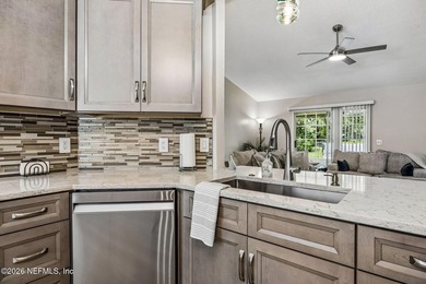 Beautifully remodeled in Hunters Green, this extensive - photo 10