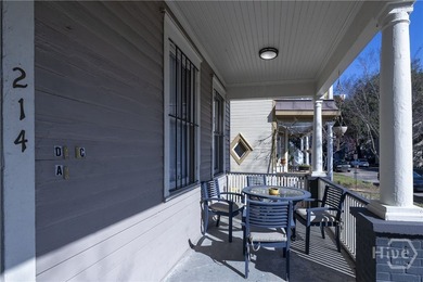 Located at 214 W Park Ave, this impressive circa-1900 property - photo 5