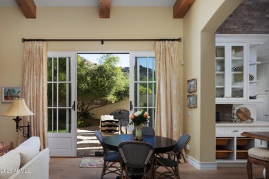 Discover timeless elegance in this 4,626 sq ft French-inspired