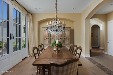 Discover timeless elegance in this 4,626 sq ft French-inspired