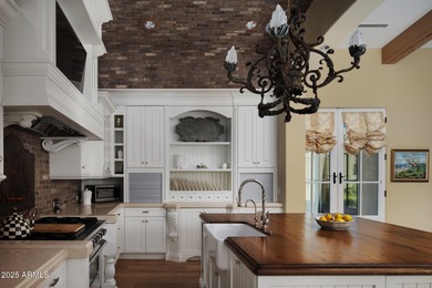 Discover timeless elegance in this 4,626 sq ft French-inspired