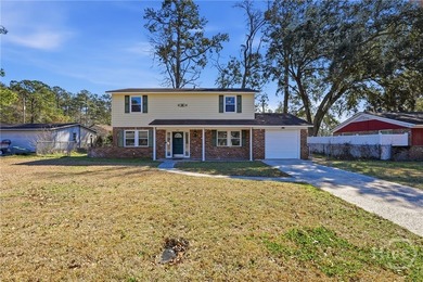 Welcome to this beautifully updated 4-bedroom, 2.5-bath home - photo 1