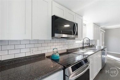 Welcome to this beautifully updated 4-bedroom, 2.5-bath home - photo 5