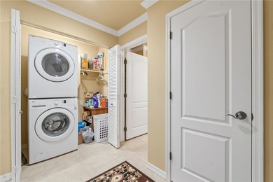 Discover elevated riverfront living in this remarkable 3rd floor