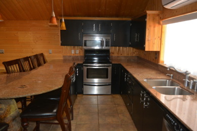 Bass Lake Cabin on a large lot - photo 4