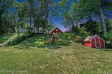 Escape to the peaceful living beauty of lake living in this - photo 4