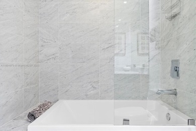 Live the Brickell lifestyle in this stunning 3-bedroom, 3-bath