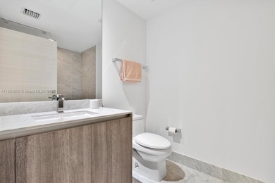 Live the Brickell lifestyle in this stunning 3-bedroom, 3-bath