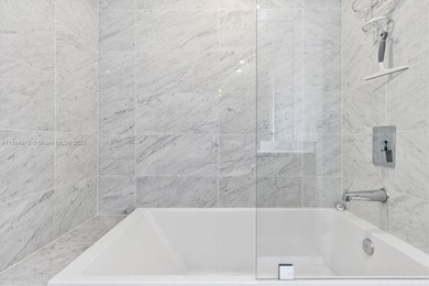 Live the Brickell lifestyle in this stunning 3-bedroom, 3-bath