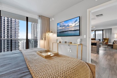 Live the Brickell lifestyle in this stunning 3-bedroom, 3-bath