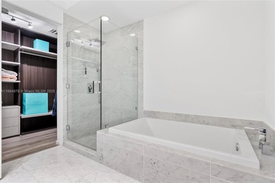 Live the Brickell lifestyle in this stunning 3-bedroom, 3-bath