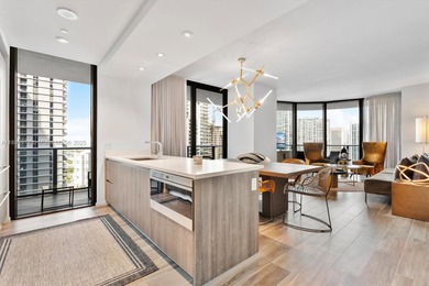 Live the Brickell lifestyle in this stunning 3-bedroom, 3-bath