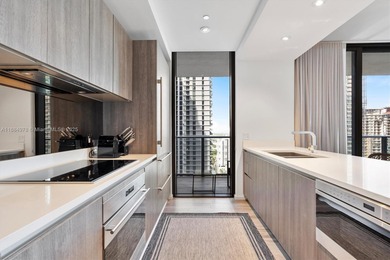 Live the Brickell lifestyle in this stunning 3-bedroom, 3-bath