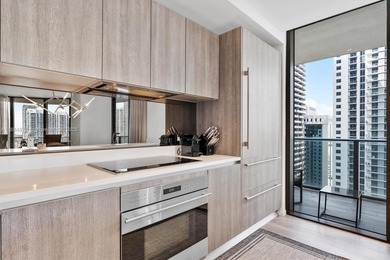 Live the Brickell lifestyle in this stunning 3-bedroom, 3-bath