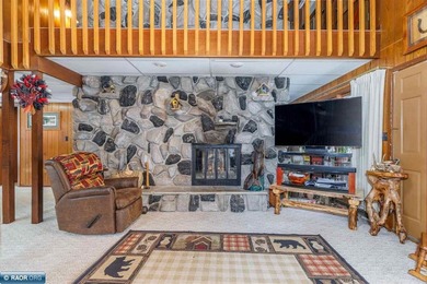 Looking for that perfect slice of Ely lake life? This 4-bedroom - photo 4