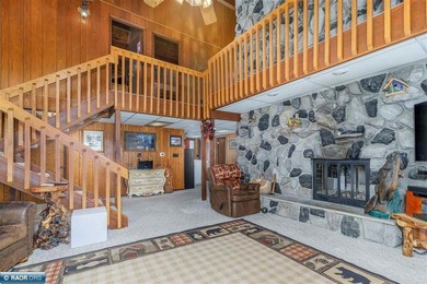 Looking for that perfect slice of Ely lake life? This 4-bedroom - photo 6