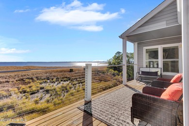 Enjoy the best of coastal living with water views of the Neuse