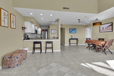 Enjoy the best of coastal living with water views of the Neuse