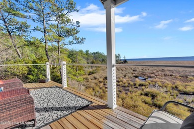 Enjoy the best of coastal living with water views of the Neuse