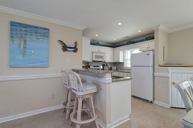 Experience oceanfront living at Admirals Quarters II in the - photo 11