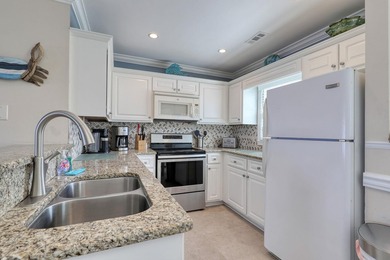 Experience oceanfront living at Admirals Quarters II in the - photo 12