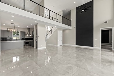 Positioned on 1.5 acres in a gated waterfront community designed - photo 6