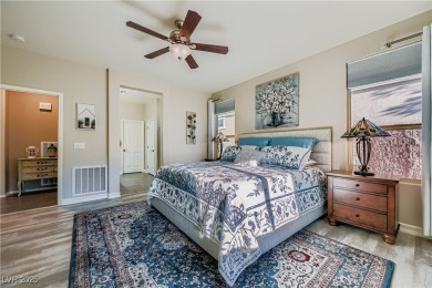 Stunning home in the highly desirable gated 55+ community