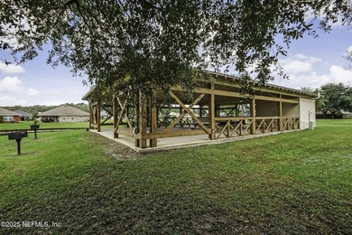 This delightful 3-bedroom, 2-bathroom home offers a warm and - photo 31