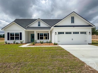 The charming Caitlin Coastal Cottage offers 3 bedrooms and 2 - photo 1