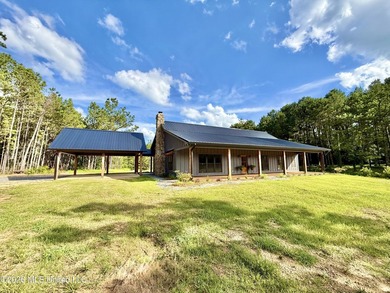 Custom waterfront new construction on 5.5+/- acres! This - photo 1