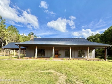 Custom waterfront new construction on 5.5+/- acres! This - photo 2
