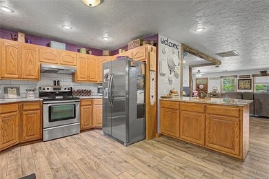 Located in the desirable Boatman area of Pryor, this 3-bedroom - photo 11
