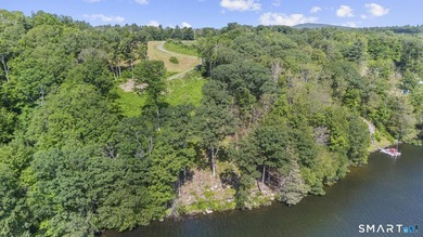 Set along the serene shores of Woodridge Lake, Lot 5 on Milton - photo 15