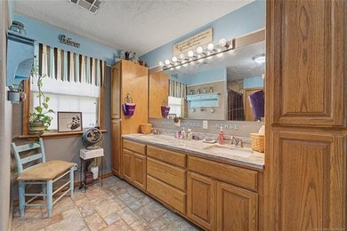 Located in the desirable Boatman area of Pryor, this 3-bedroom - photo 20