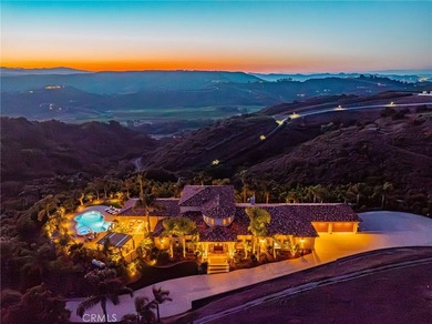Discover unparalleled luxury and serene country living in this - photo 1