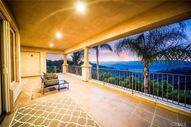 Discover unparalleled luxury and serene country living in this - photo 2