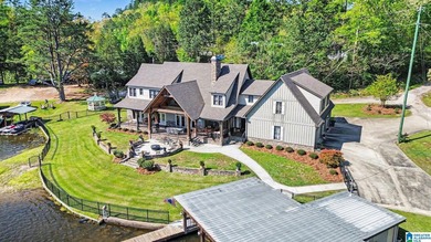 Prestigious Lake Mitchell HOME! Stunning water views from the - photo 1