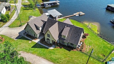 Prestigious Lake Mitchell HOME! Stunning water views from the - photo 4