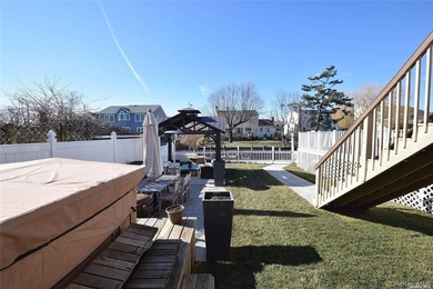 Contemporary three-level, waterfront home. Concrete basement has - photo 2