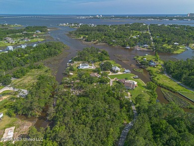 Waterfront Living Awaits on April Bayou - Over Half an Acre in - photo 4