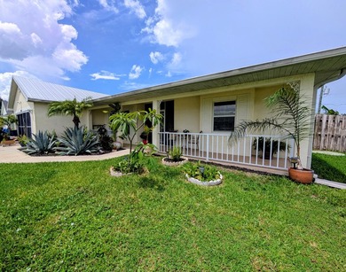 This freshly painted spacious pool home sits on a corner lot - photo 1