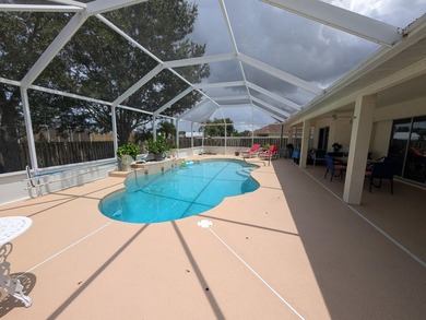 This freshly painted spacious pool home sits on a corner lot - photo 7