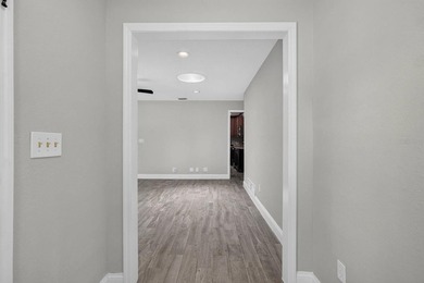 Welcome to this meticulously reimagined, concrete-block ranch - photo 2