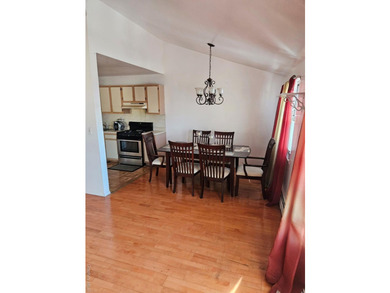 Nicely maintained 2 family home with wood floors. 1st floor has - photo 5