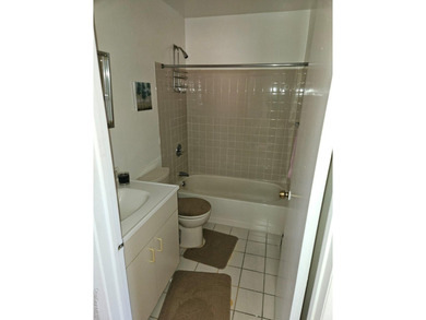 Nicely maintained 2 family home with wood floors. 1st floor has - photo 9