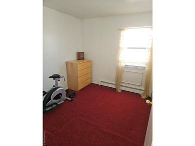 Nicely maintained 2 family home with wood floors. 1st floor has - photo 10