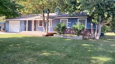 Antrim County Chain of Lakes Home For Sale in Bellaire Michigan