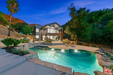A rare Malibu sanctuary offering the best of both worlds-the - photo 1