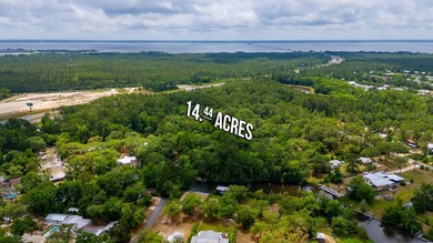 14.4 acres located just North Of the Clyde Wells Bridge for easy - photo 4